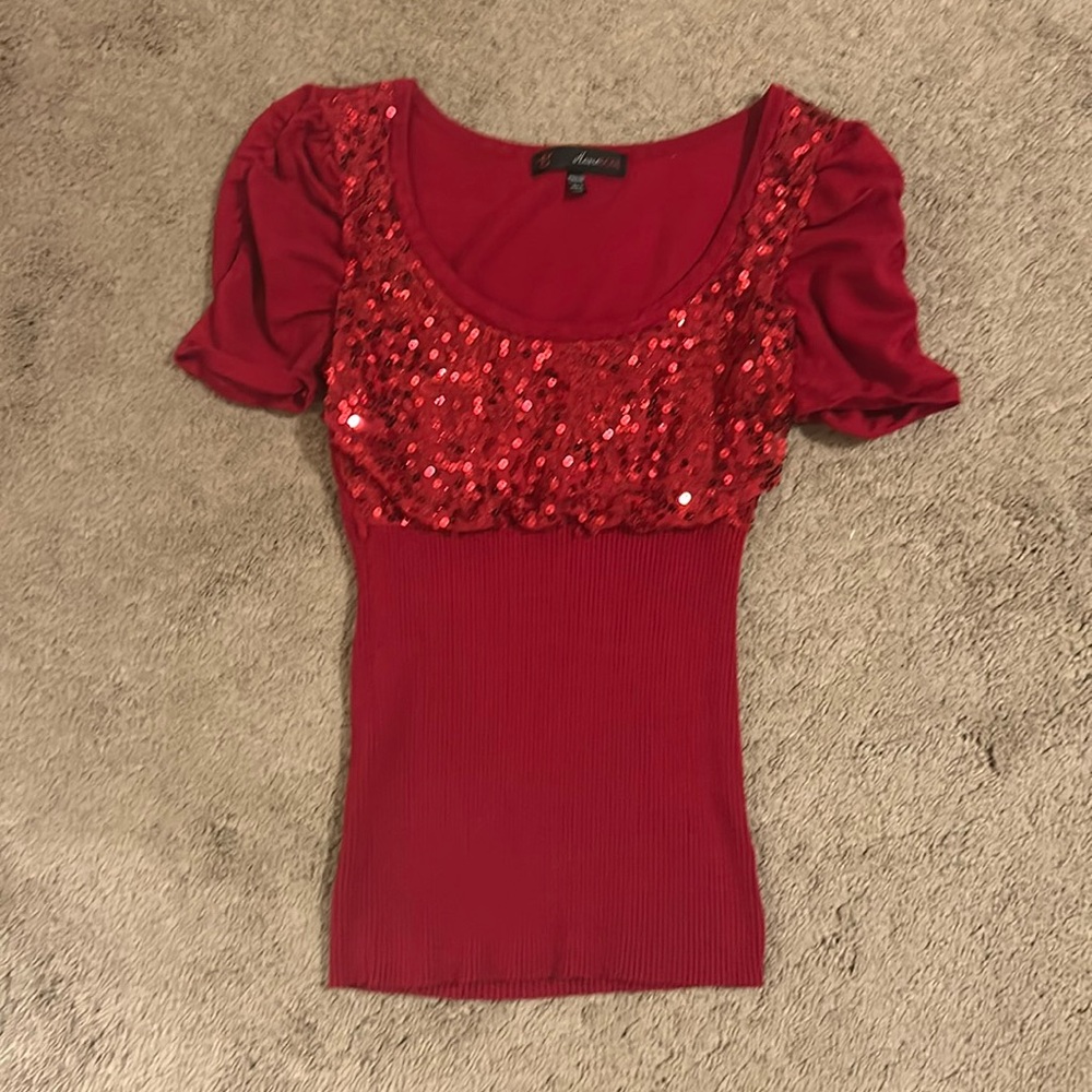 Red sequin short sleeve,  tight ribbed under breasts.